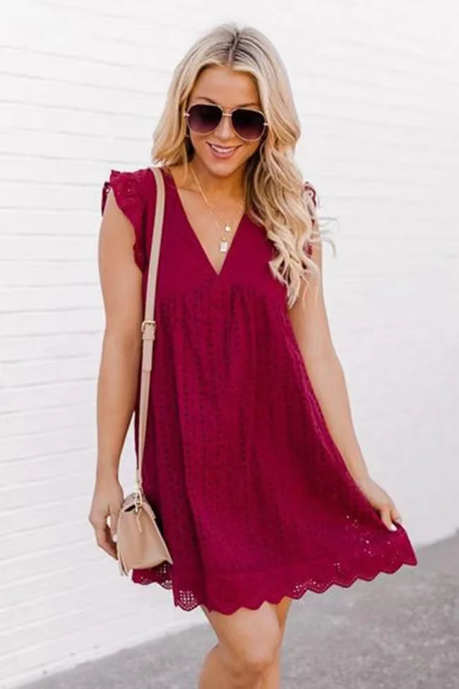 Cross border new lace jacquard hollowed out V-neck dress with pockets and lining shorts for women in Europe and America